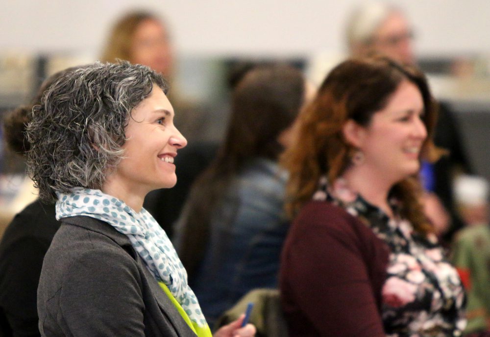 Sylvania's Dean of Student Services Heather Lang enjoys the keynote at the conference on culturally responsive teaching.