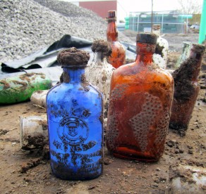 Blue bottle is marked as "Milk of Magnesia"