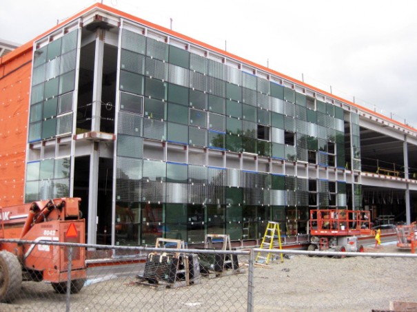 Glass installation on the new facade of Building 7 continues on schedule. Photo taken May 22, 2013.