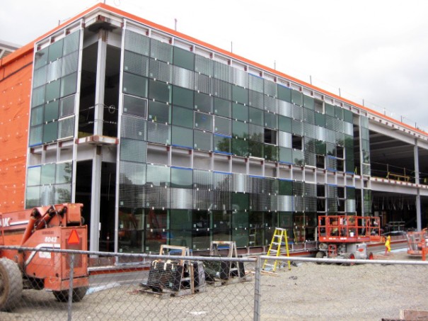 Glass installation on the new facade of Building 7 continues on schedule.  Photo taken May 22, 2013.