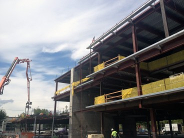 The new academic building is going up fast - scheduled open for class in fall 2014.