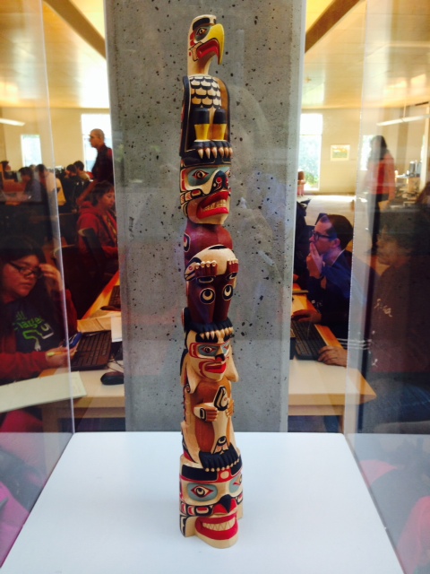 A small replica of Richard Hunt's Welcome Pole is housed in the PCC Sylvania library. It offers an intimate look at all of the totem's images. 