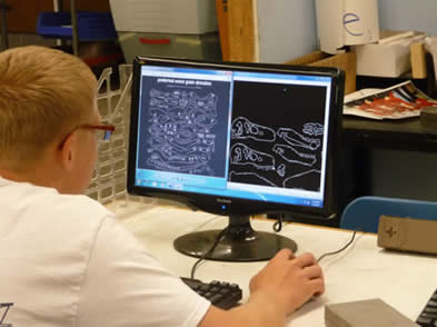 Student using CAD software.